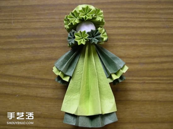 折纸娃娃的制作方法穿裙子娃娃的折法图解